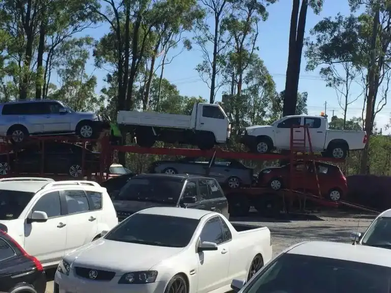 Small truck transport on car carrier