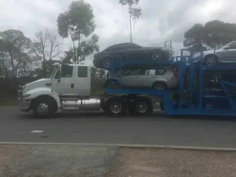 Auto Mover Car Carrier Transporting Multiple Vehicles