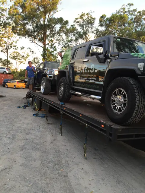 Auto Mover Hummer H2 Loaded on Transport Carrier