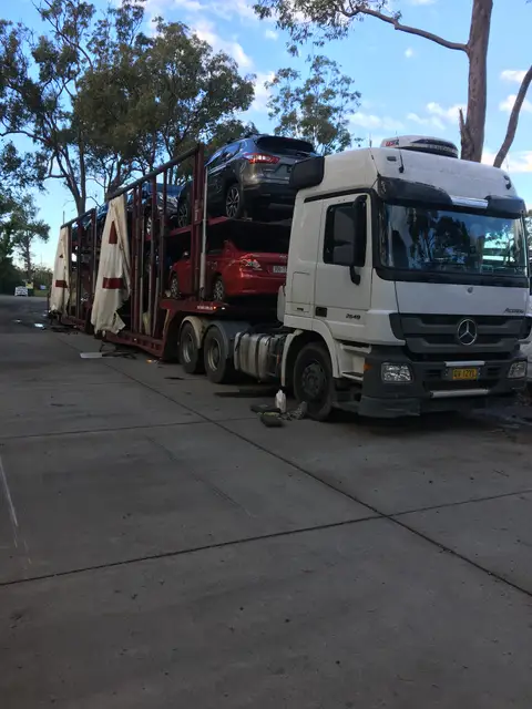 Auto Mover Mercedes Truck Transporting Multiple Vehicles