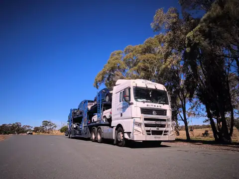 Auto Mover Sitrak Truck Transporting Multiple Vehicles