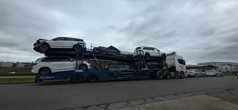 Multi-Level Car Carrier Loaded With SUVs